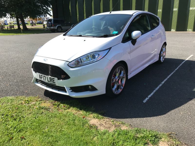 I just dig the 2-door ST. Long live coupes.
